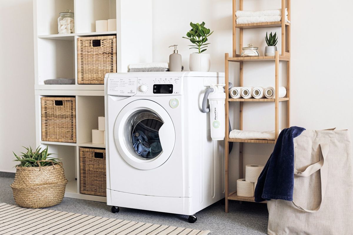 Home laundry room with a front-load washer